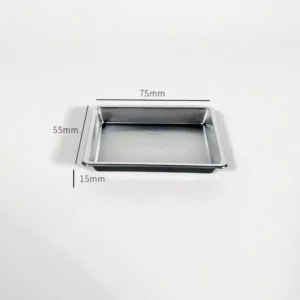 Close up of a silver plastic miniature tray with measurements 75mm by 55mm